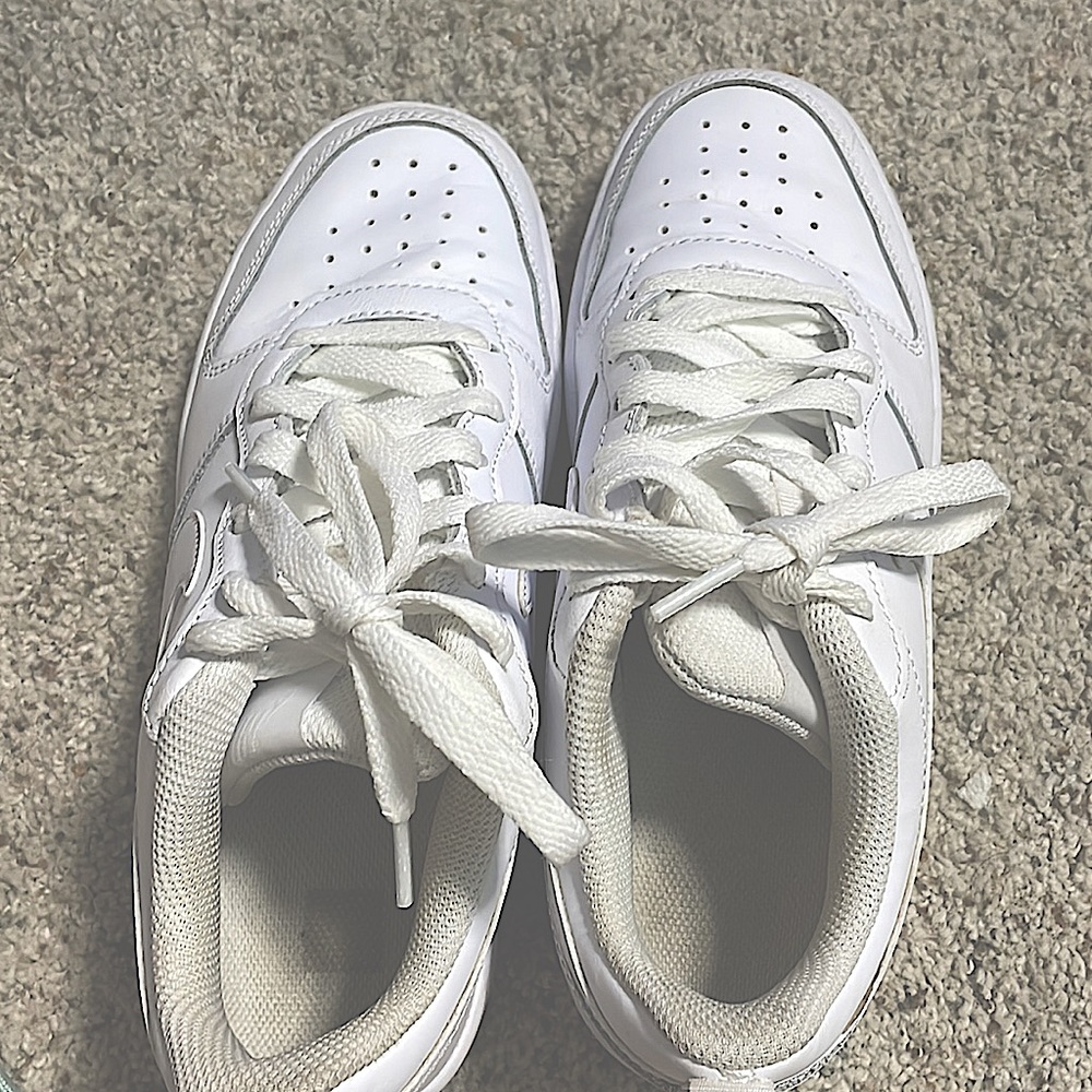 these are nike white court shoes
